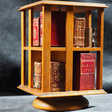Load image into Gallery viewer, Revolving Bookcase. Slim, revolving, sycamore bookcase for miniature books. 1904.
