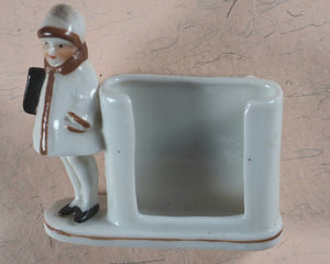 Needlecase 'blook'. Complete with attached bevelled pocket mirror and original 'blook' holder.