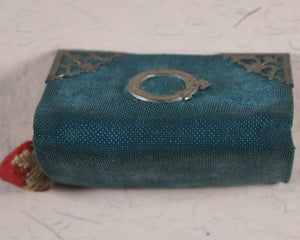 Needlecase 'blook'. Complete with attached bevelled pocket mirror and original 'blook' holder.
