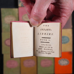 Infant's Library. Marshall, John. Circa 1800. 16 volumes. Complete with original sycamore bookcase.