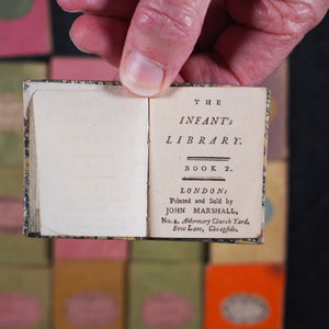 Infant's Library. Marshall, John. Circa 1800. 16 volumes. Complete with original sycamore bookcase.