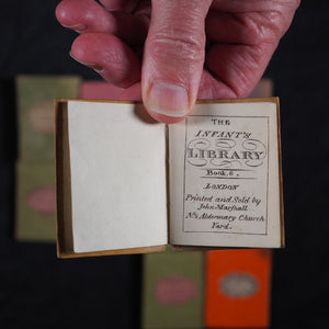 Infant's Library. Marshall, John. Circa 1800. 16 volumes. Complete with original sycamore bookcase.