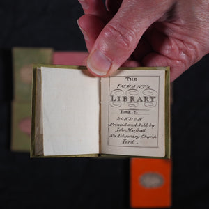 Infant's Library. Marshall, John. Circa 1800. 16 volumes. Complete with original sycamore bookcase.