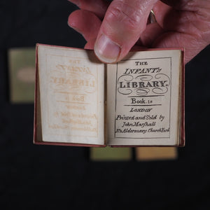 Infant's Library. Marshall, John. Circa 1800. 16 volumes. Complete with original sycamore bookcase.