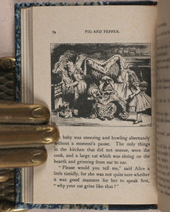 Carroll, Lewis. Alice in Wonderland [with] Alice through the Looking-Glass and what Alice found there. Wood, Edmund S. Paris. 1950.