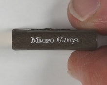 Load image into Gallery viewer, Cameron, Frank. Micro Guns. Mosaic Press. Cincinnati, Ohio. 1982. De Luxe edition.
