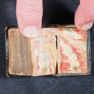 Biblia or a Practical Summary of Old & New Testaments. 1728. Wilkin, R. [London]. 1727. Underlined in red and hand corrected to 1728. Black binding.