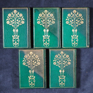 Dickens, Charles Christmas Stories. Birdsall & Sons [Northampton]. Circa 1908. Complete five volume set on original oak book display.