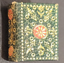 Load image into Gallery viewer, New Testament. c1896)     Bound in charcoal leather with gilt edges, extensive floral     gilt and red to cover

