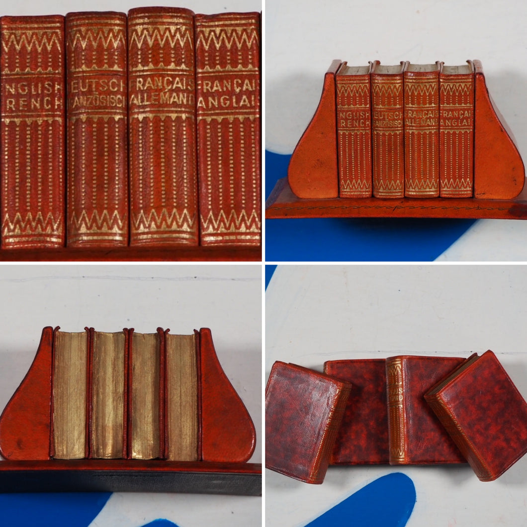 ATTRACTIVE DESK SET OF FOUR LEATHER-BOUND LILLIPUT DICTIONARIES (ENGLISH, FRENCH AND GERMAN). BY PROF. WERSHOVEN. >>MINIATURE BOOK<<