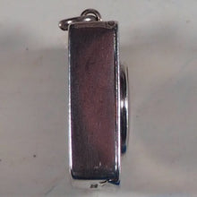 Load image into Gallery viewer, Smallest English Dictionary in the World. Comprising: besides the ordinary and newest words in the language, short explanations of a large number of scientific, philosophical, literary and technical terms. [SOLID SILVER LOCKET].1893. &gt;&gt;MINIATURE BOOK&lt;&lt;
