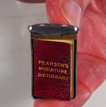 Load image into Gallery viewer, Smallest English Dictionary in the World. Comprising: besides the ordinary and newest words in the language, short explanations of a large number of scientific, philosophical, literary and technical terms. [SOLID SILVER LOCKET].1893. &gt;&gt;MINIATURE BOOK&lt;&lt;
